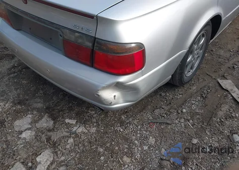 2002 Cadillac Seville Sts z USA, uszkodzony, nr VIN 1G6KY54902U102873